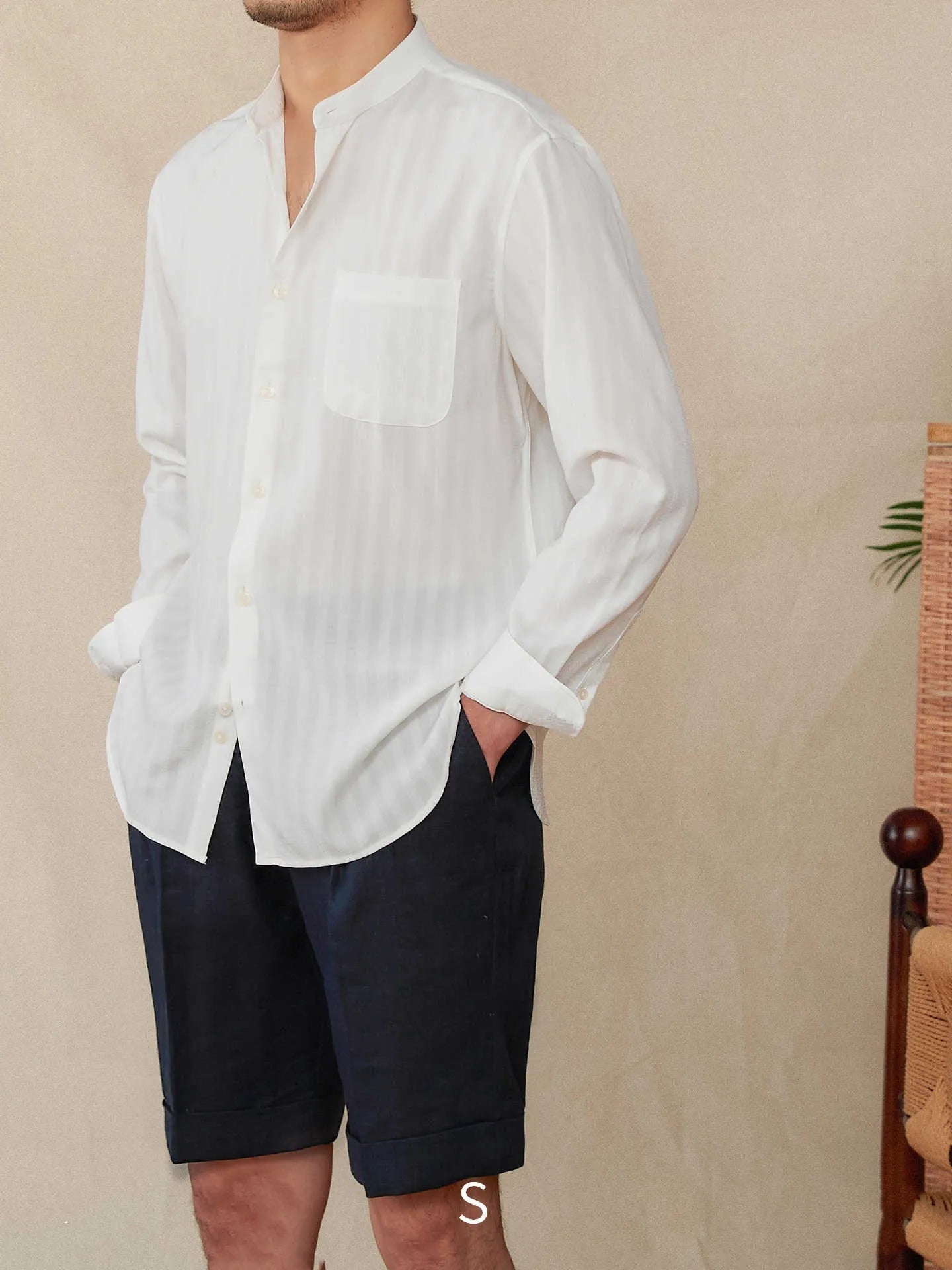 Blue and white seersucker striped men's shirt with baseball collar and loose lapel design