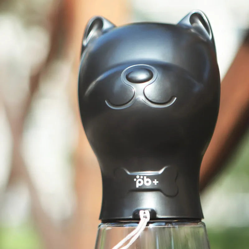 Portable pet dog drinker water bottle in black with automatic leak proof outdoor feeder for dogs and cats