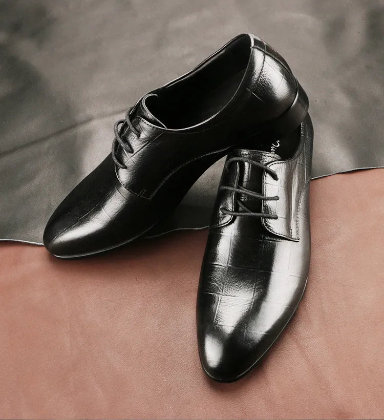 Men's black leather derby shoes with a checkered pattern on the pointed toe.