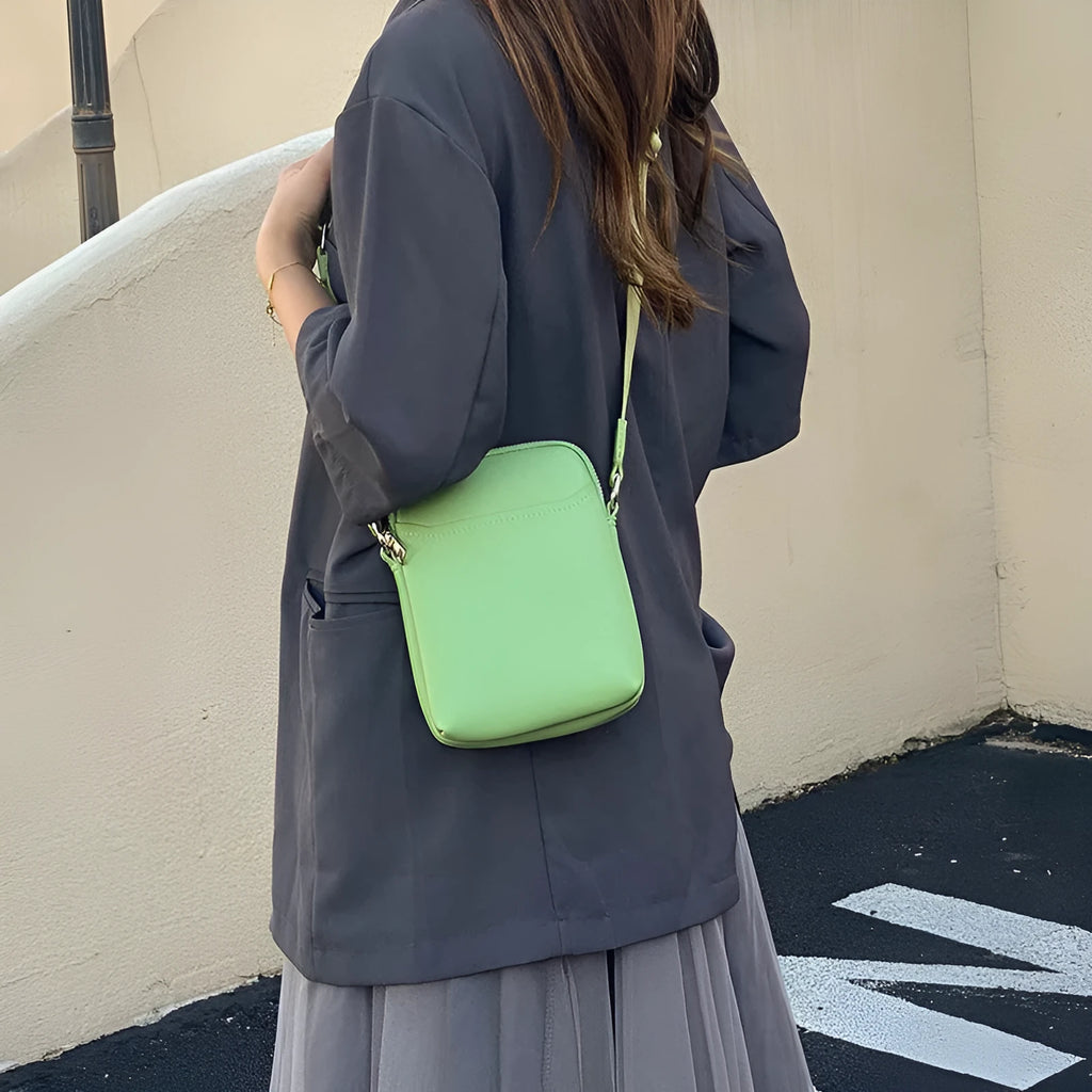 Solid colour mobile phone crossbody bag for women in black, beige, khaki, or green.