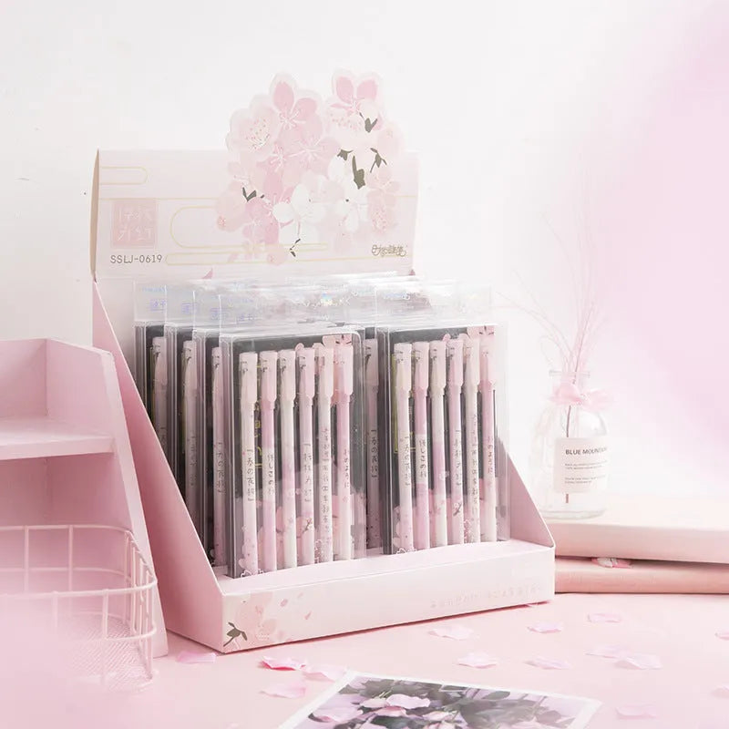 Six black Creative Sakura gel pens with pull-out mechanisms and 0.5mm needle tips.