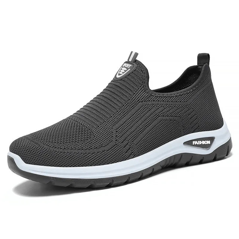 Men's black and grey breathable casual shoes with mesh uppers and PVC soles in a round-toe tennis style.