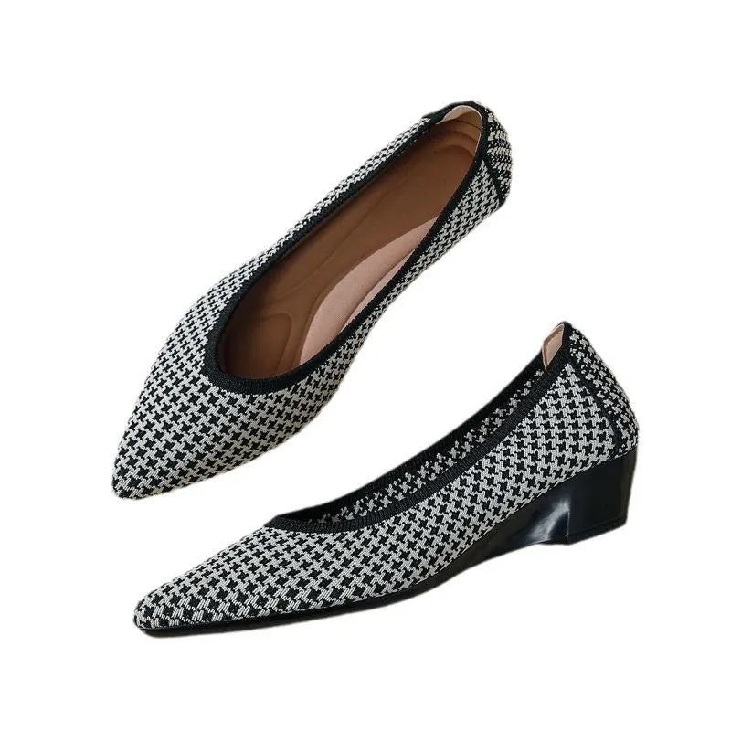 Women's pointed toe Flyknit wedge pumps in leopard print, showcasing low heel and mesh upper.