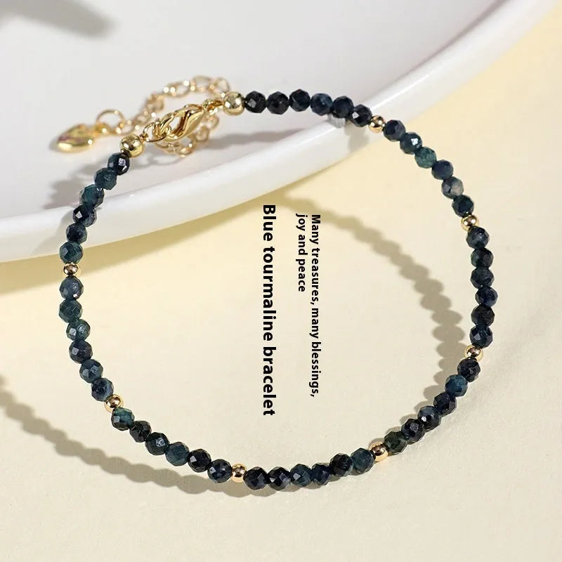 Blue tourmaline spacer bead bracelet with 3mm cut beads for women