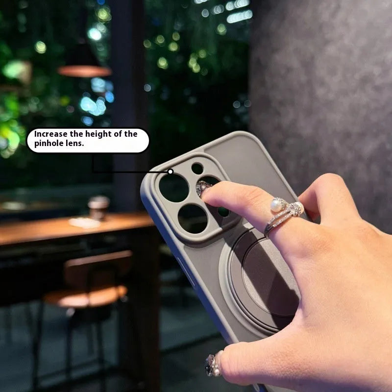 Frosted transparent magnetic phone case with a built-in stand for iPhone, shown in plum colour.