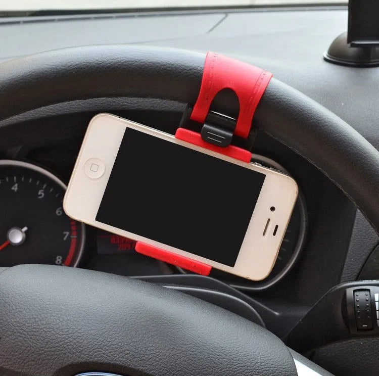 Black universal steering wheel phone clip holder mounted with a smartphone displaying a map.
