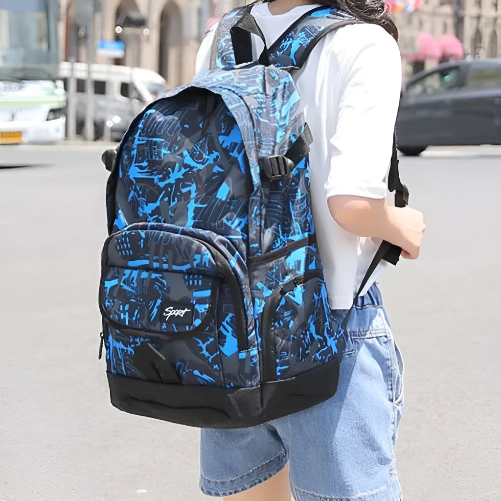 Blue and red classic nylon backpack showing front view and multiple compartments