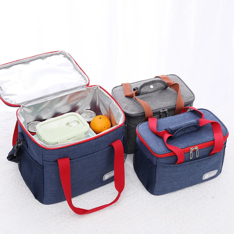 Insulated crossbody picnic bag in Oxford cloth with shoulder strap, shown in grey colour