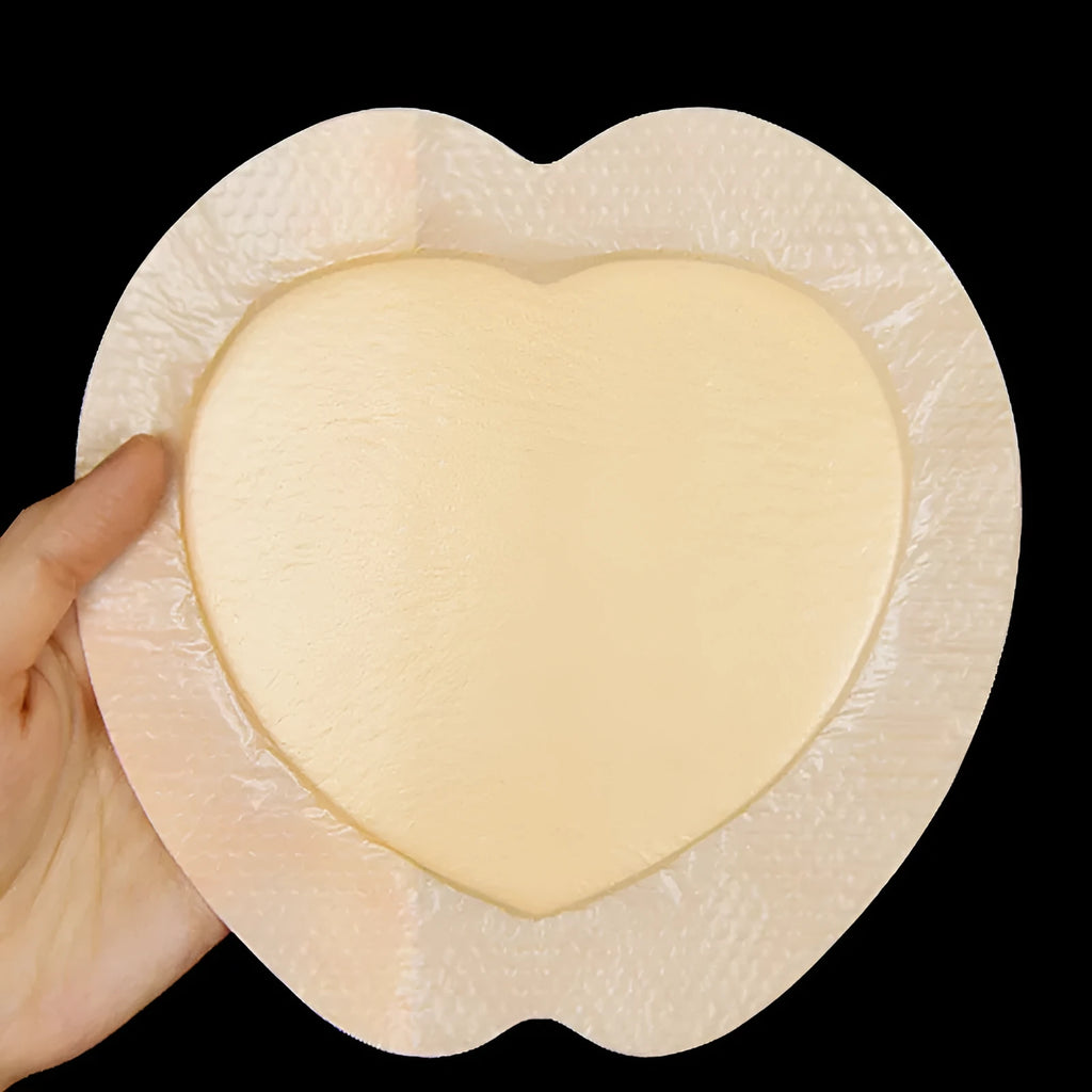 Skin-coloured medical silicone foam dressing for bedsore prevention