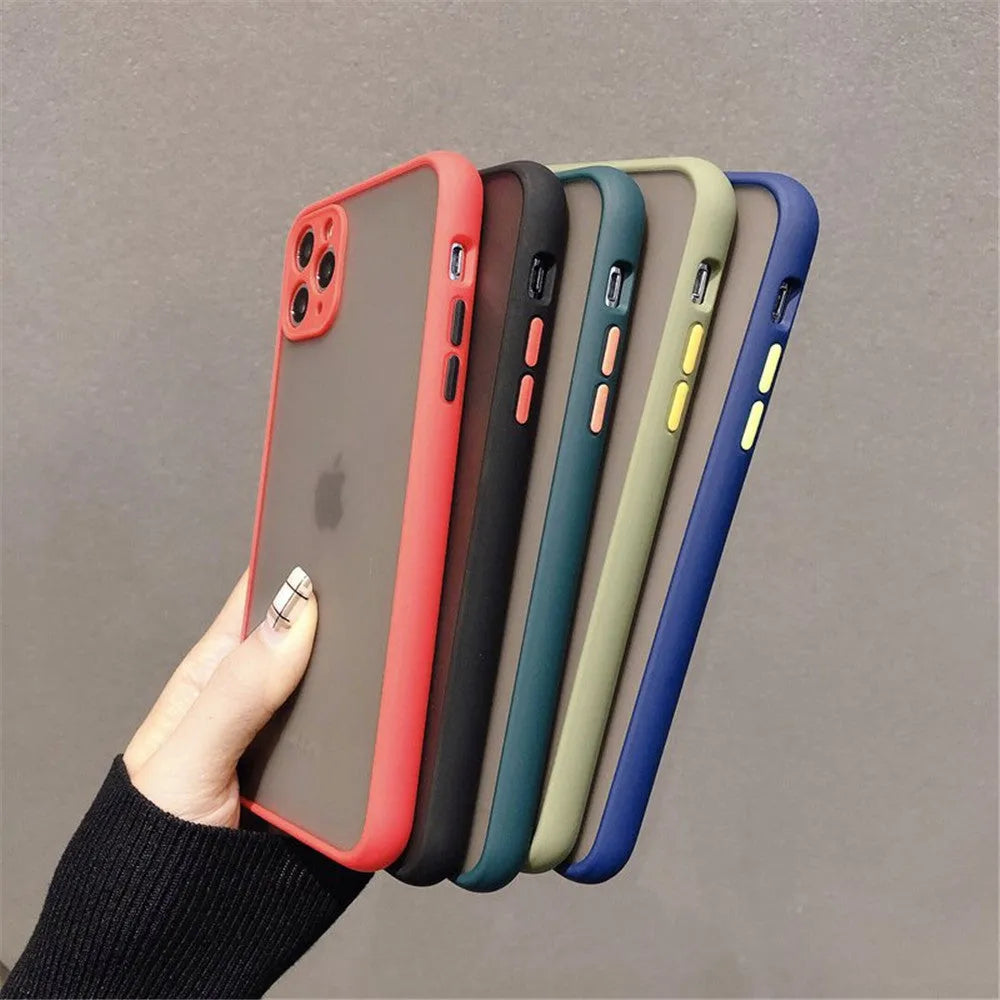 Transparent solid-colour shockproof iPhone case showing soft TPU sides and hard PC back, compatible with multiple models.