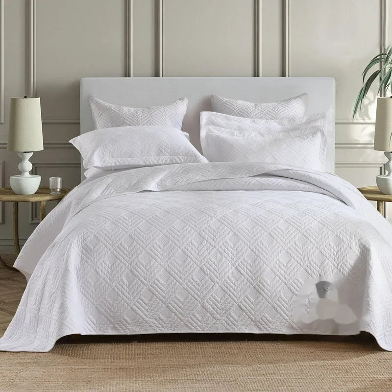 Pure cotton bed cover three-piece set shown in a light colour on a bed, featuring a quilt cover and sheet.