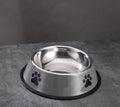 Non-slip stainless steel pet bowl in gray on a floor, size 22cm