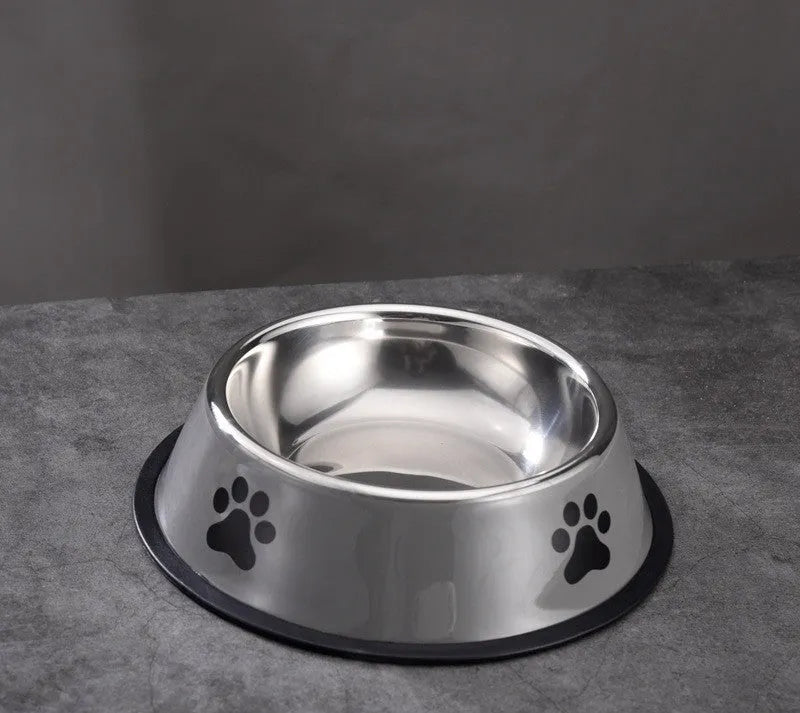 Non-slip stainless steel pet bowl in gray on a floor, size 22cm