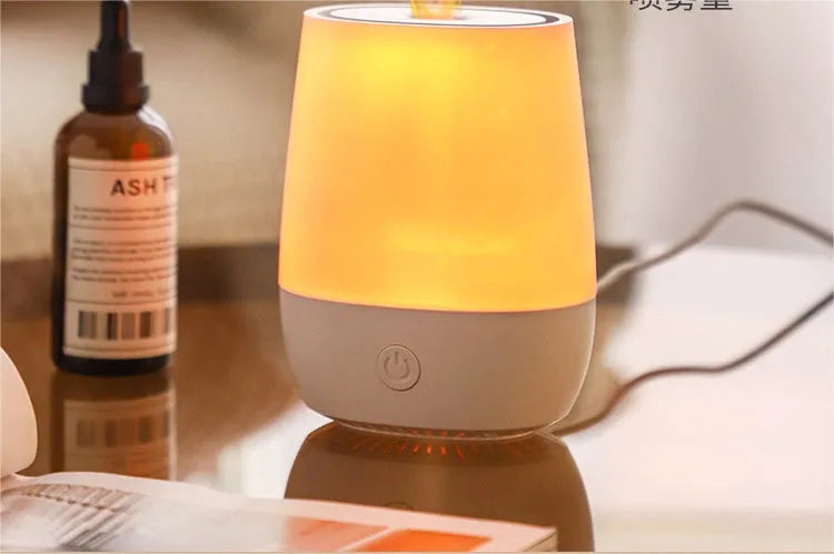 White USB aroma diffuser with flame simulation effect showing water tank and Type-C port