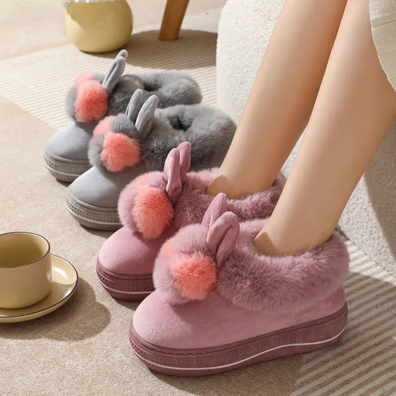 Black thick-soled high heel winter slipper with plush upper and textured TPR sole.