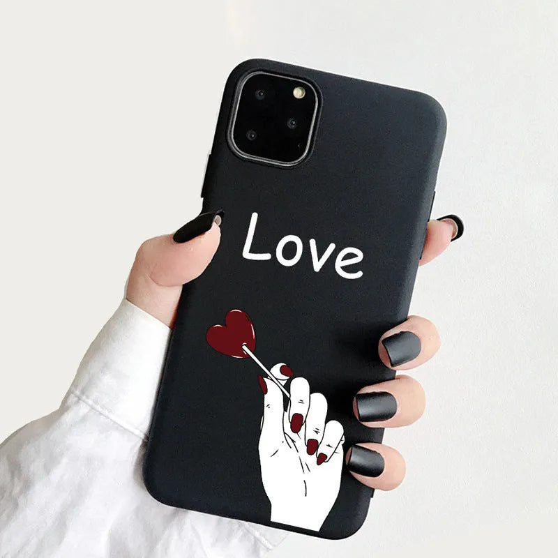 Frosted TPU iPhone case showing painted 'LOVE' letter design on a pink background.