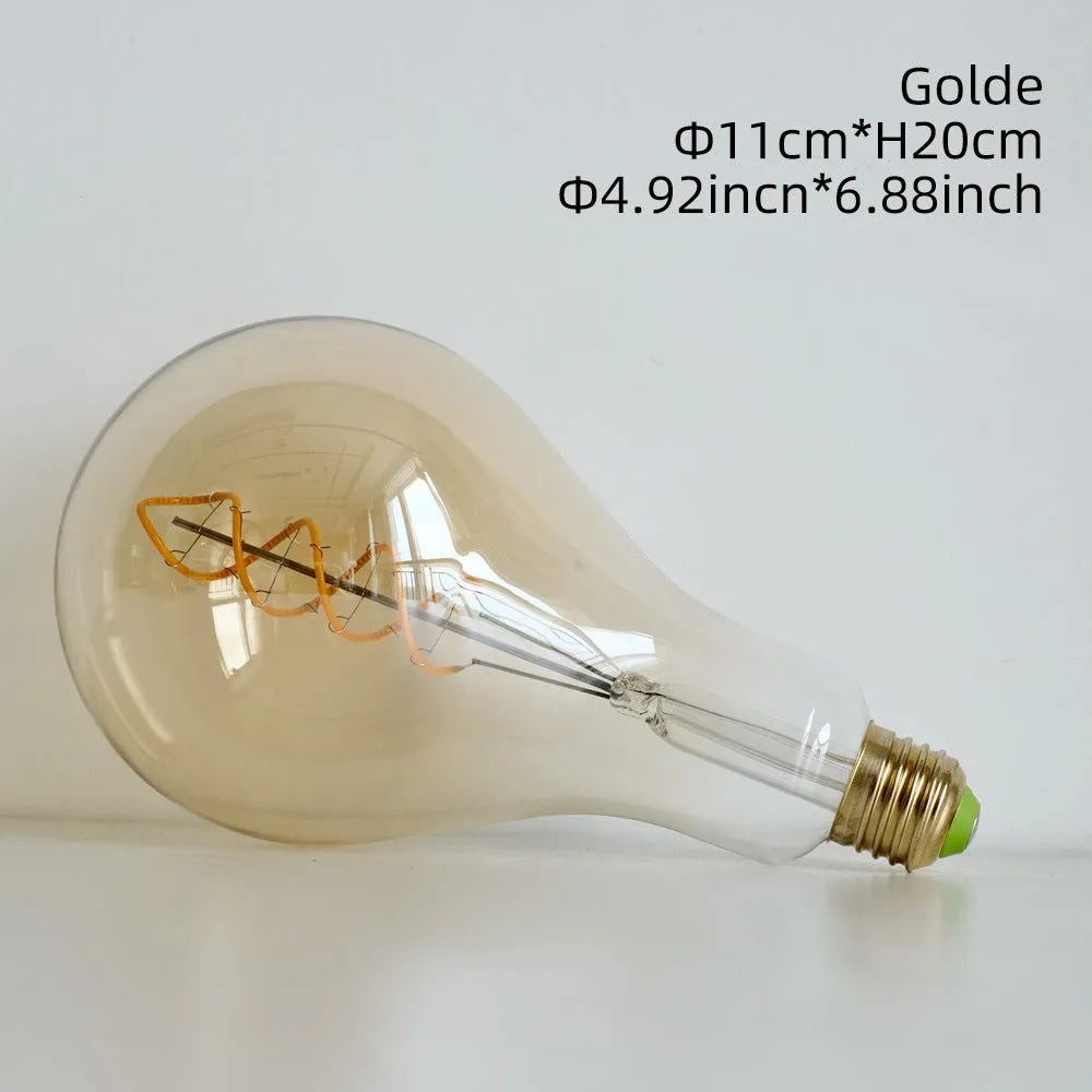 Double helix LED filament bulb in gold finish with spiral design visible through glass housing