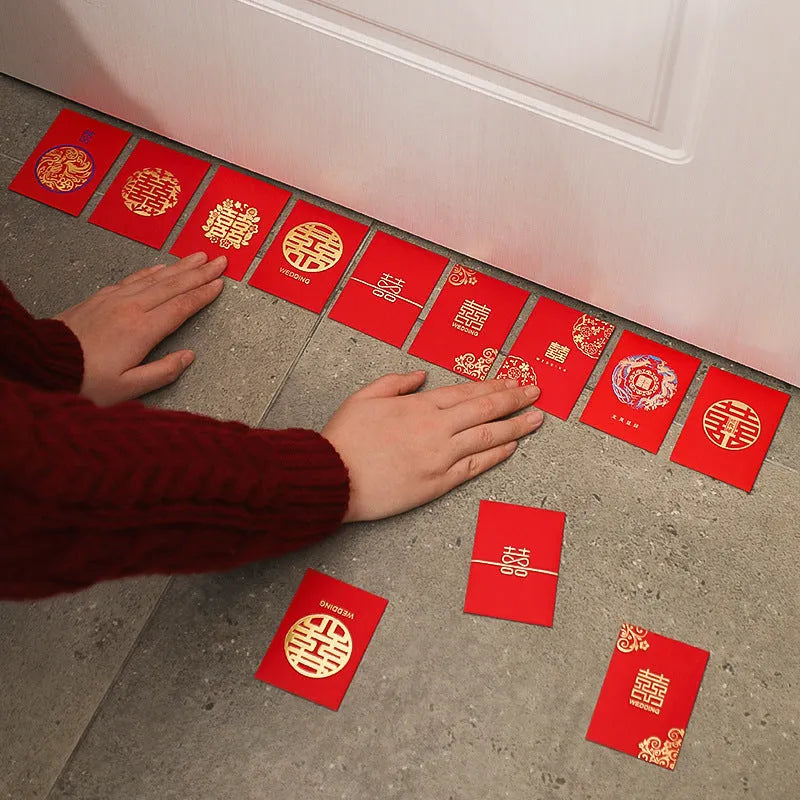 Pack of mini Chinese style wedding red packets in various colours for small cash gifts