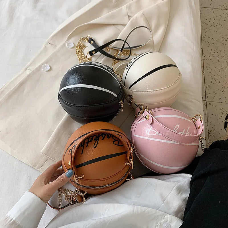 Small round women's handbag in PU with zipper closure, available in black soccer colour pattern, front view