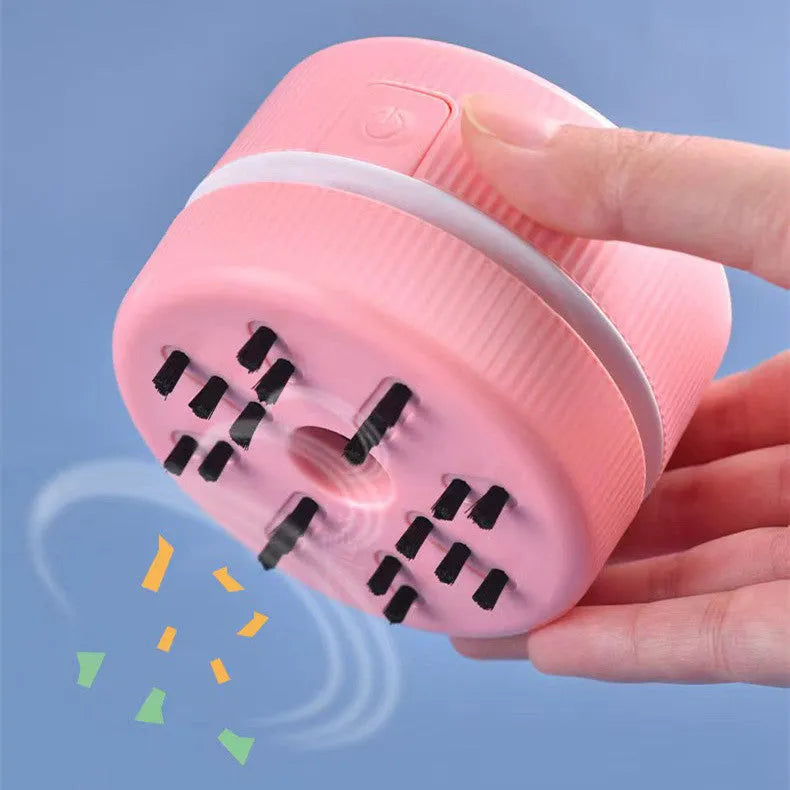 Portable mini desktop vacuum cleaner in blue colour with handheld design
