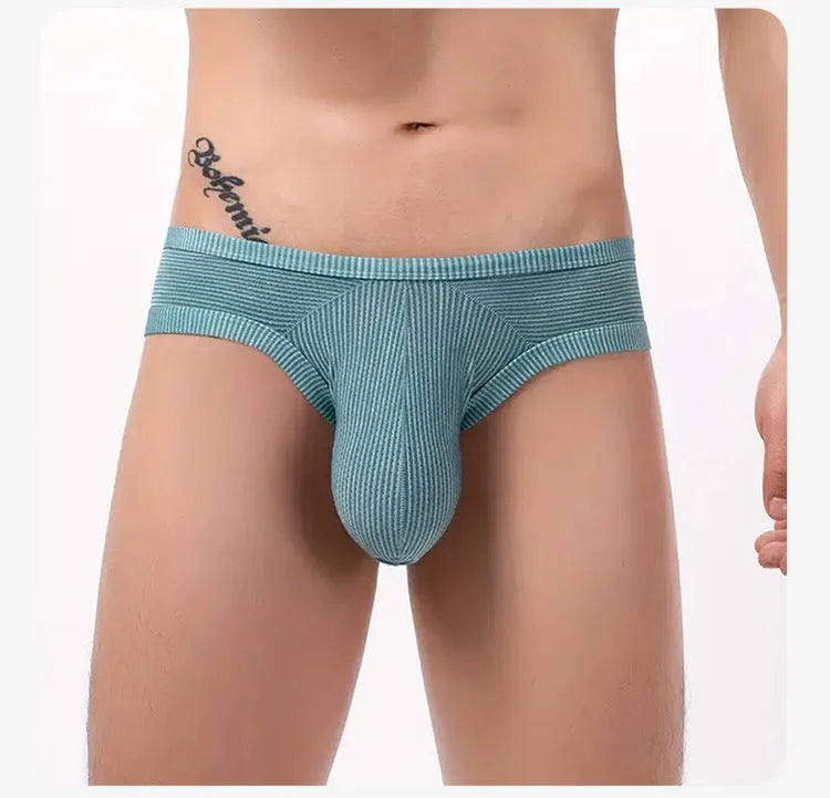 Men's cotton briefs in seven colour options showing low waist boxer style design
