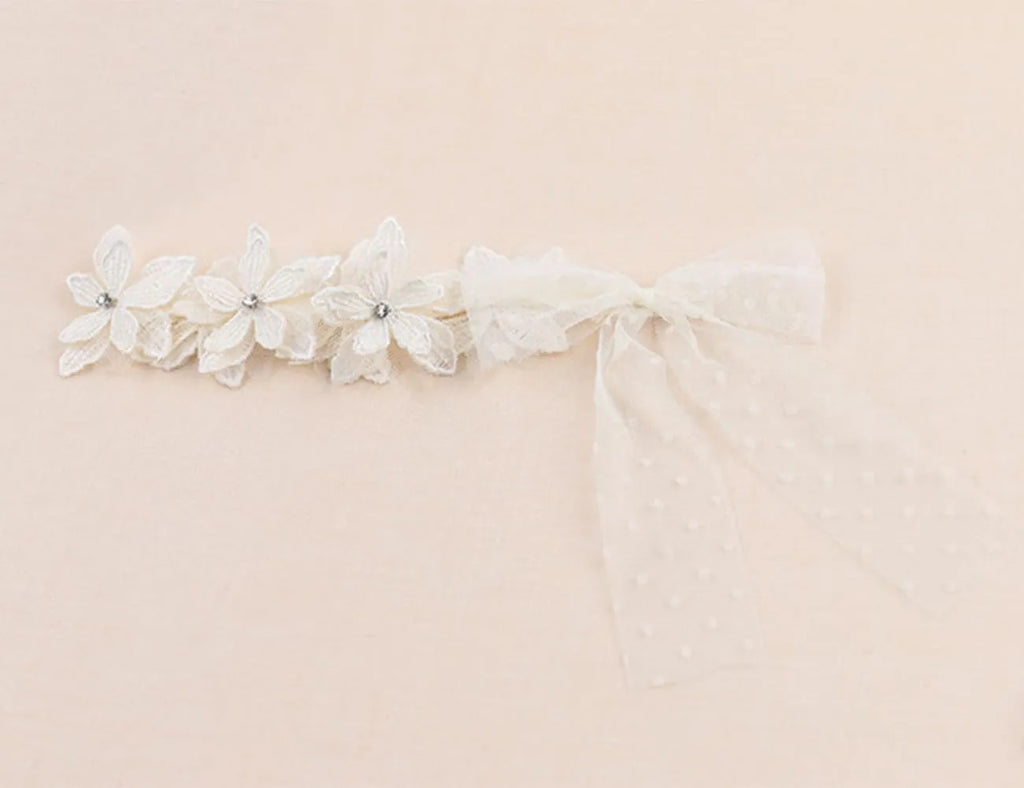 Baby girls headband with double bow-knot and lace floral design in soft cloth material
