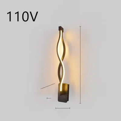 Minimalist Nordic design LED wall lamp with a silicone shade, mounted on a bedroom wall.
