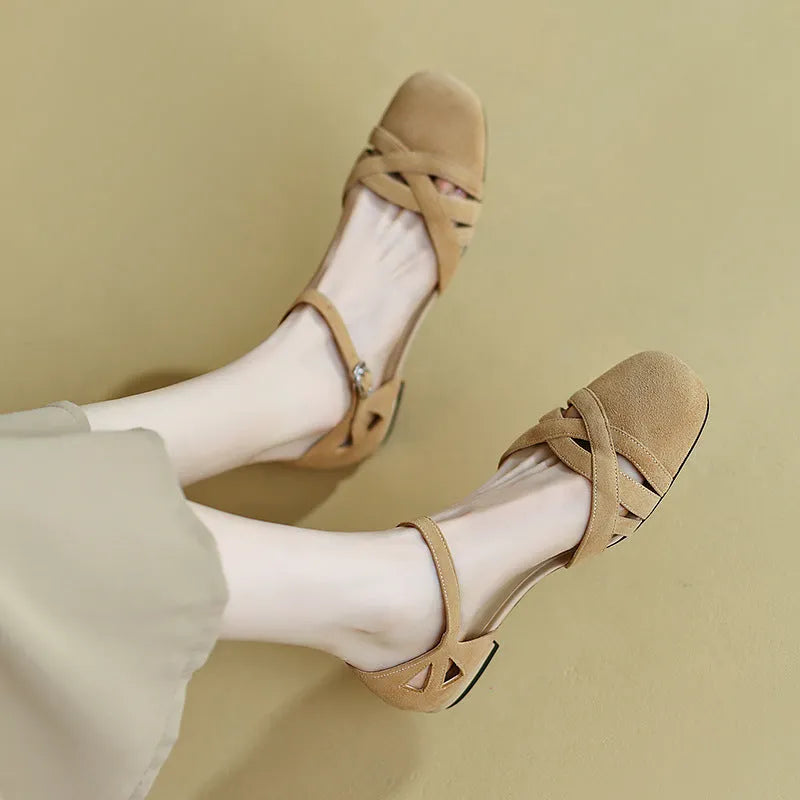 Women's classic Roman sandals with buckle fastening in apricot colour showing round toe design