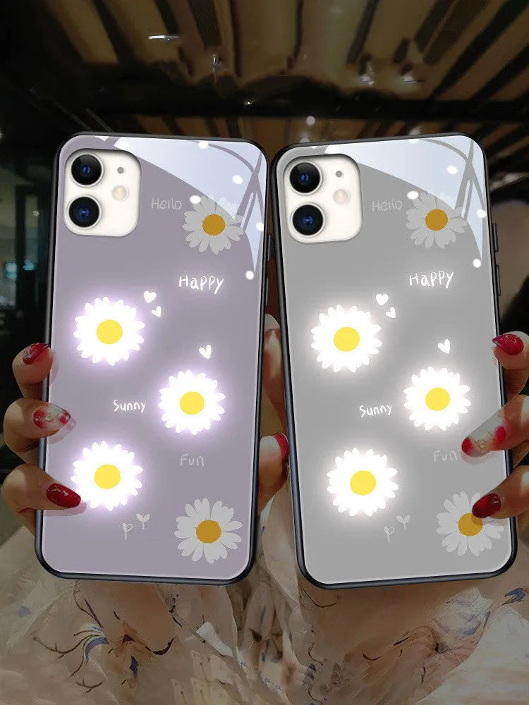White luminous iPhone case with painted purple daisy design and voice-activated colour light.