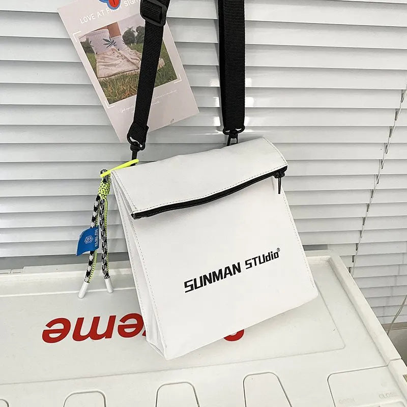 Polyester messenger backpack in street style with sewing line detail and Oxford lining