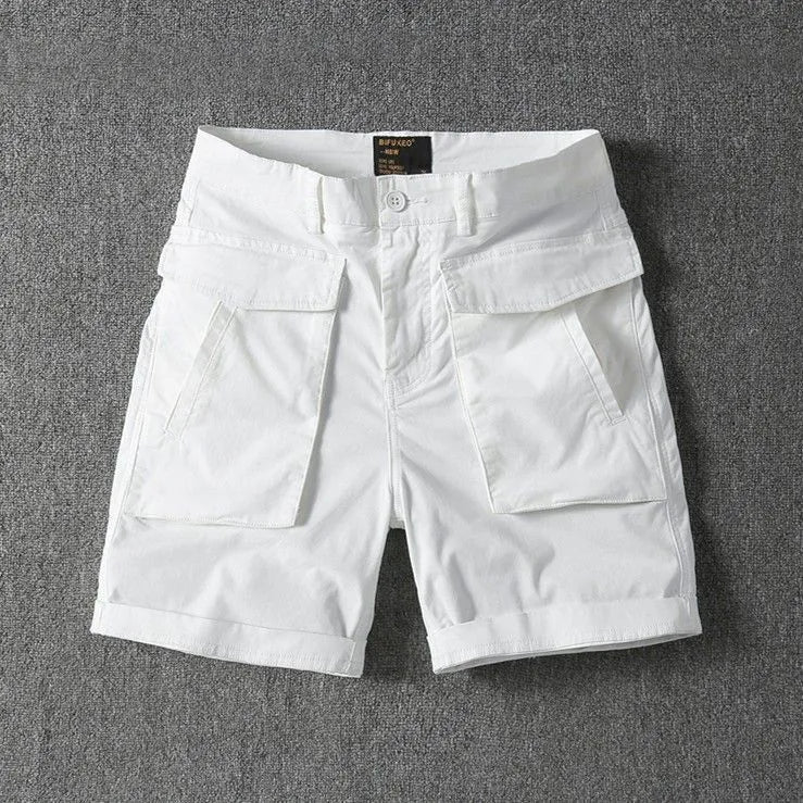Men's straight-leg cotton cargo shorts in khaki with multiple pockets and stretch fabric.