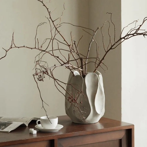 Irregular artistic ceramic vase in magnesium clay for flower arrangements, available in high and low style options