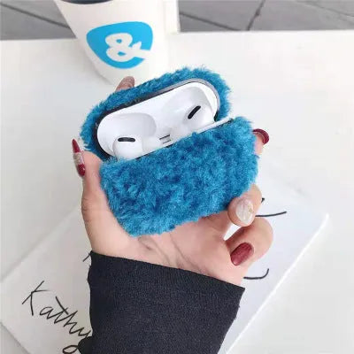 Green plush plastic headphone cover for Apple AirPods showing creative design elements