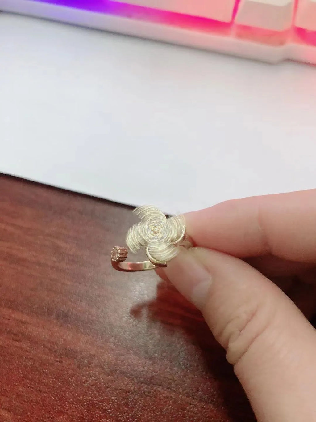 Rotating micro inlaid ring with spinning windmill design in gold or silver finish