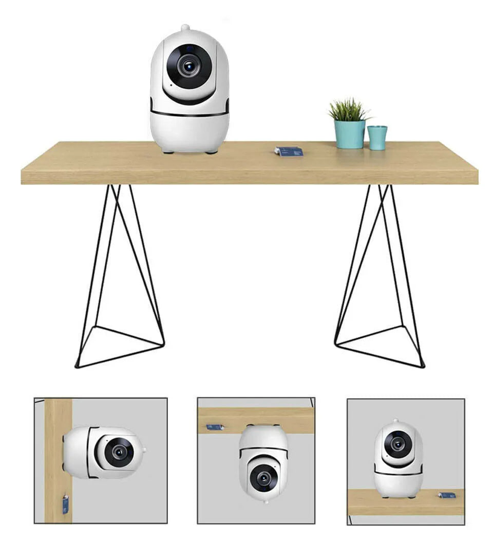 White 1080P WiFi CCTV IP camera with pan tilt lens on desk showing night vision mode