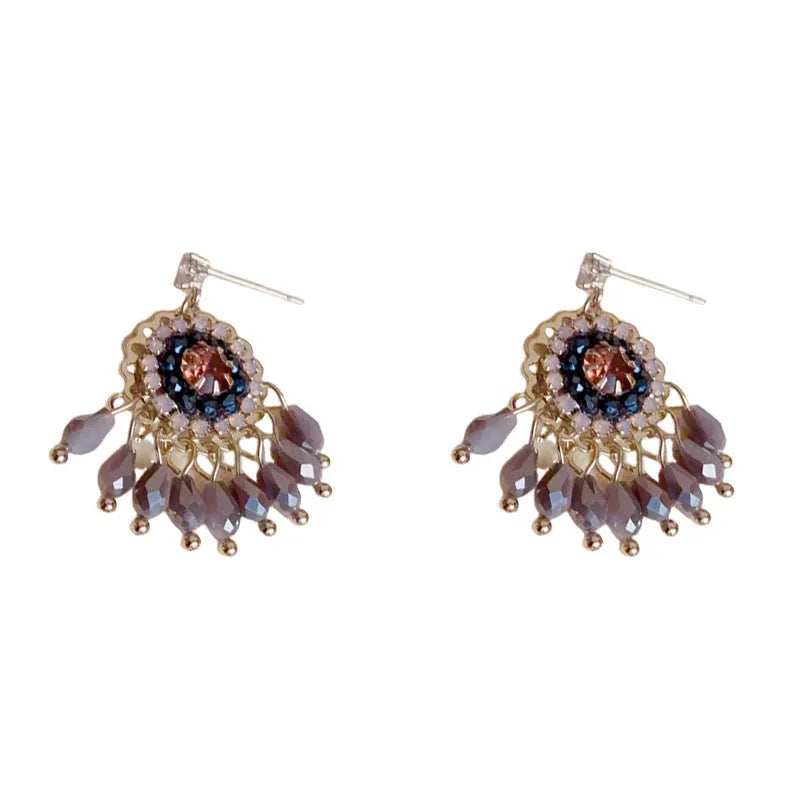 Geometric crystal tassel earrings with thick gold plating and embedded diamond crystals