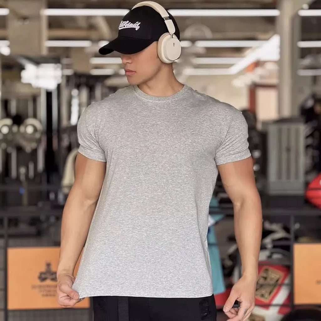 Men's solid colour slim fit polyester short sleeve sports t-shirt in black, front view