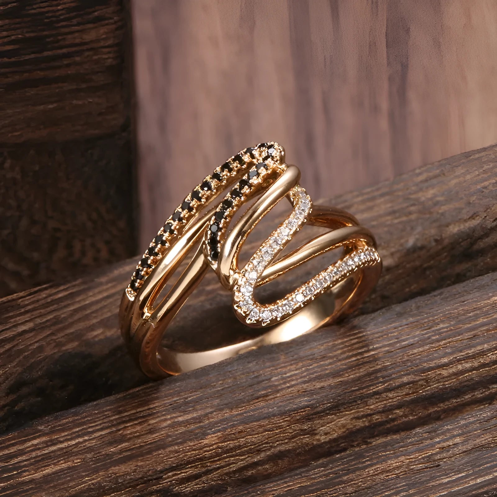 Close-up of a women's copper ring with micro-inlaid sparkling zircon stones in WK2230 colour.