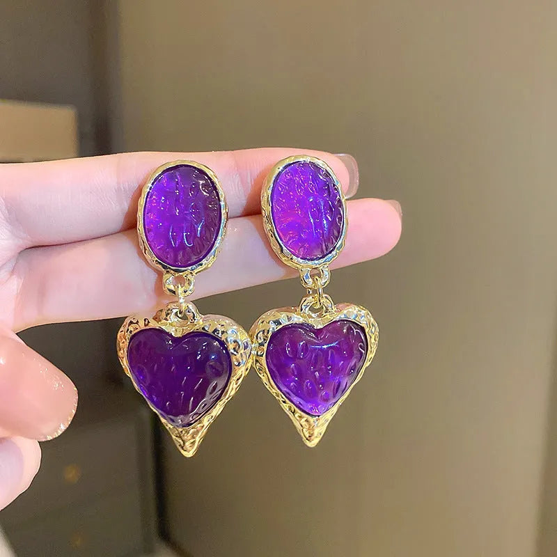 Pleated oval love heart stud earrings in purple, red, green, and yellow white colours with butterfly backs