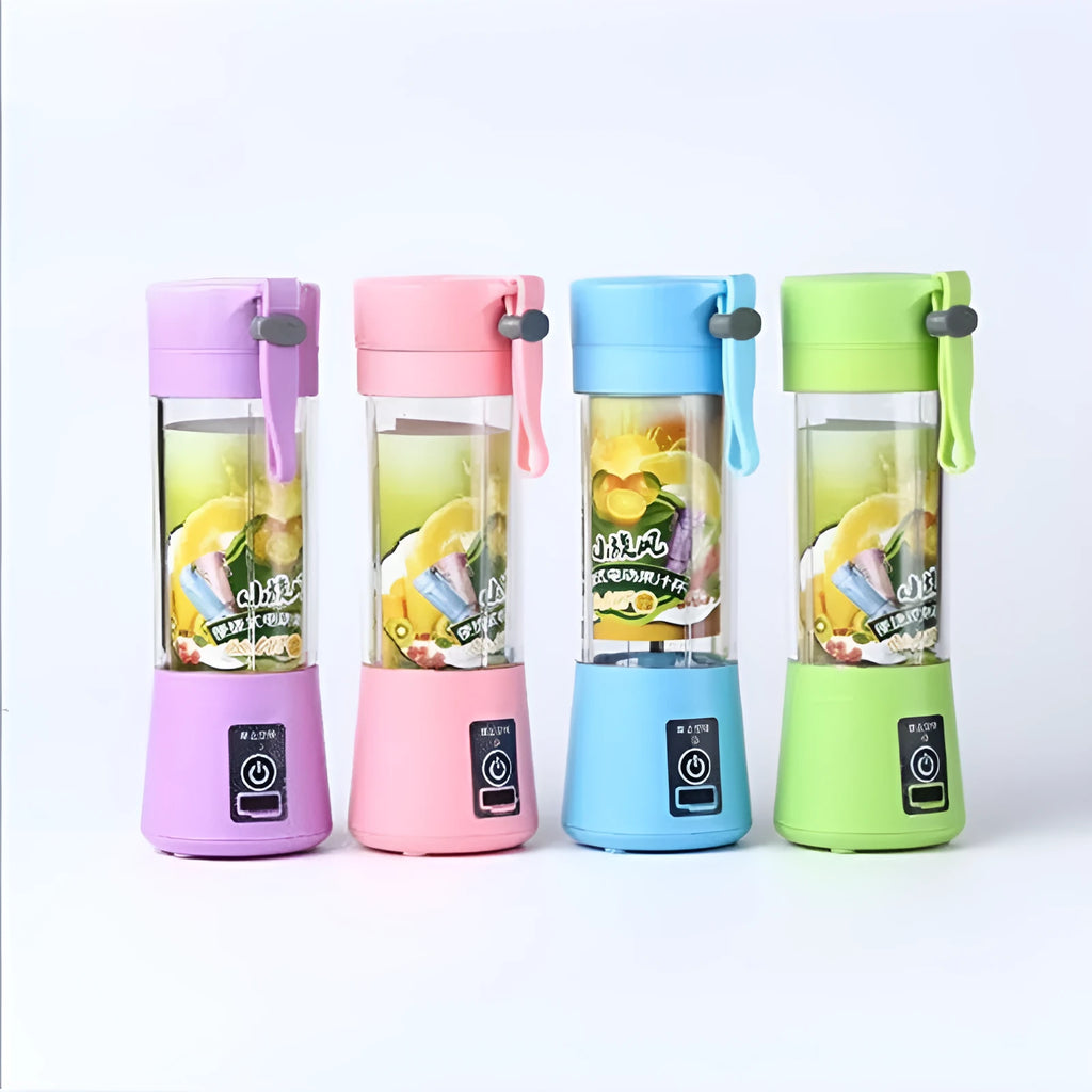 Pink mini USB electric fruit juicer with carrying rope on a kitchen countertop.