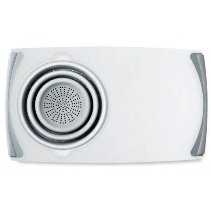 Grey 3-in-1 chopping board with detachable folding drain basket on a kitchen counter.