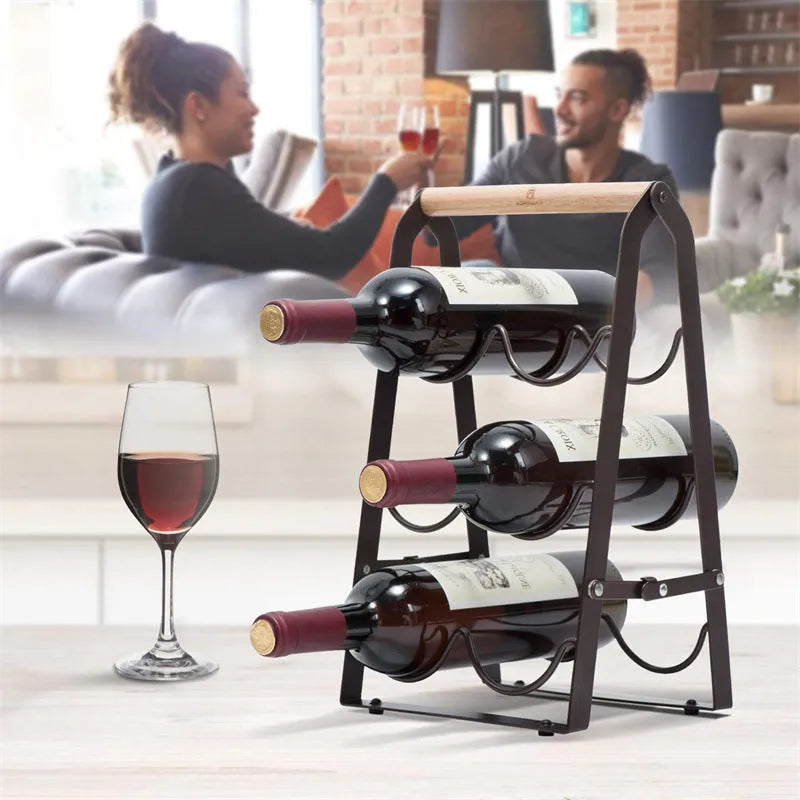 Black iron metallic desktop wine rack holding one wine bottle on a kitchen countertop