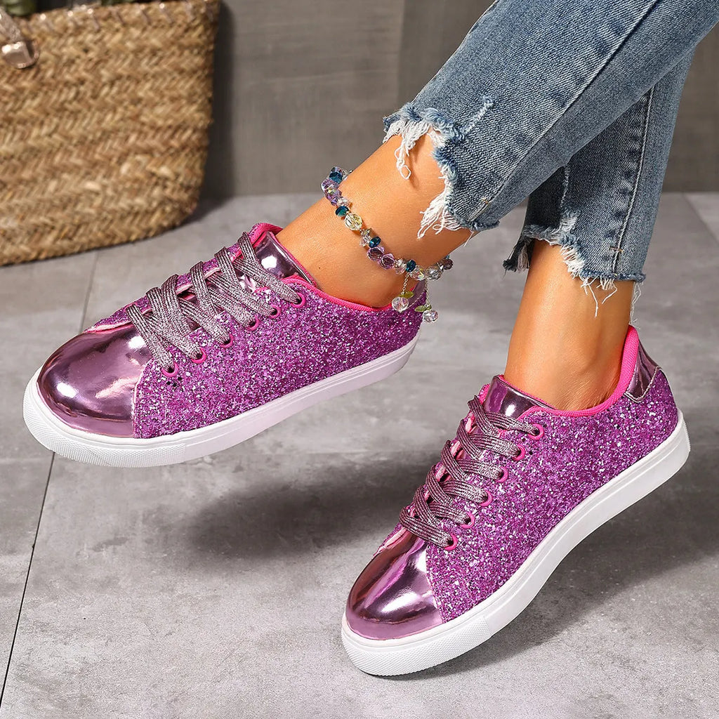 Women's black plus size board shoes with sequin detailing and white front lace-up fastening on a rubber sole.