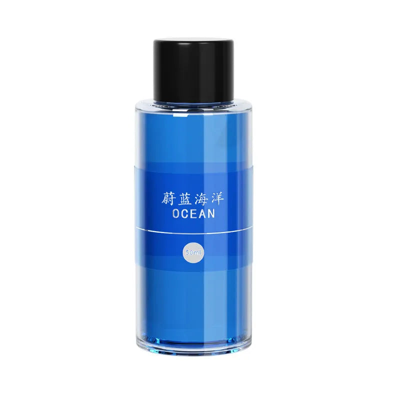 Smart spray car air freshener unit in Gentleman's Black or Qian Shan Cui colours with Ocean and Gulong fragrance refill bottles