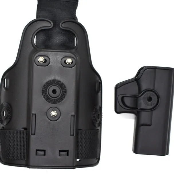 Green tactical plastic leg holster attached to a waist plate, showing quick-pull opening.