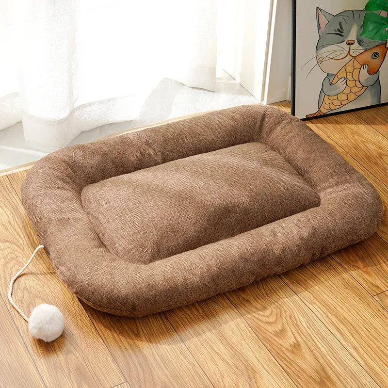 Brown and green pet cushion with removable cover shown in four sizes for small to medium dogs and cats