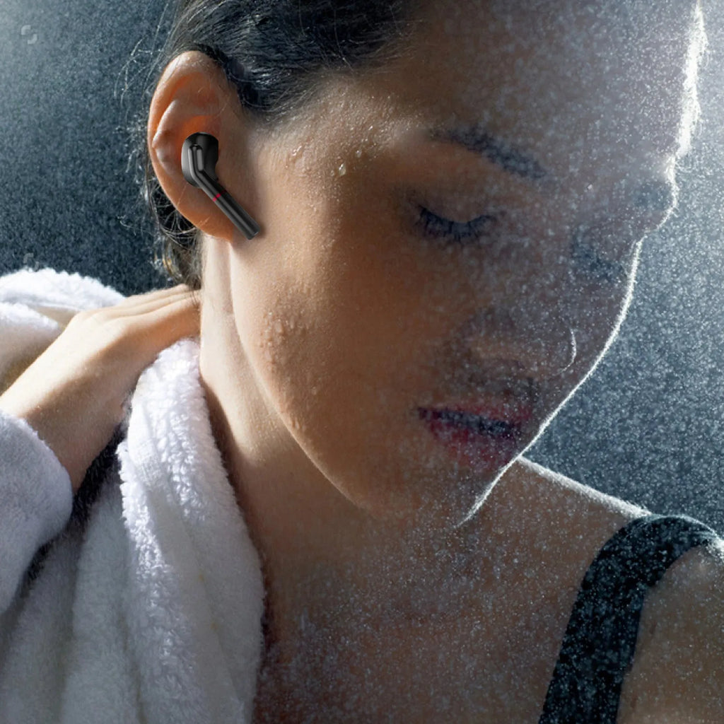 Black and white VV1 true wireless Bluetooth earphones with a compact charging case.