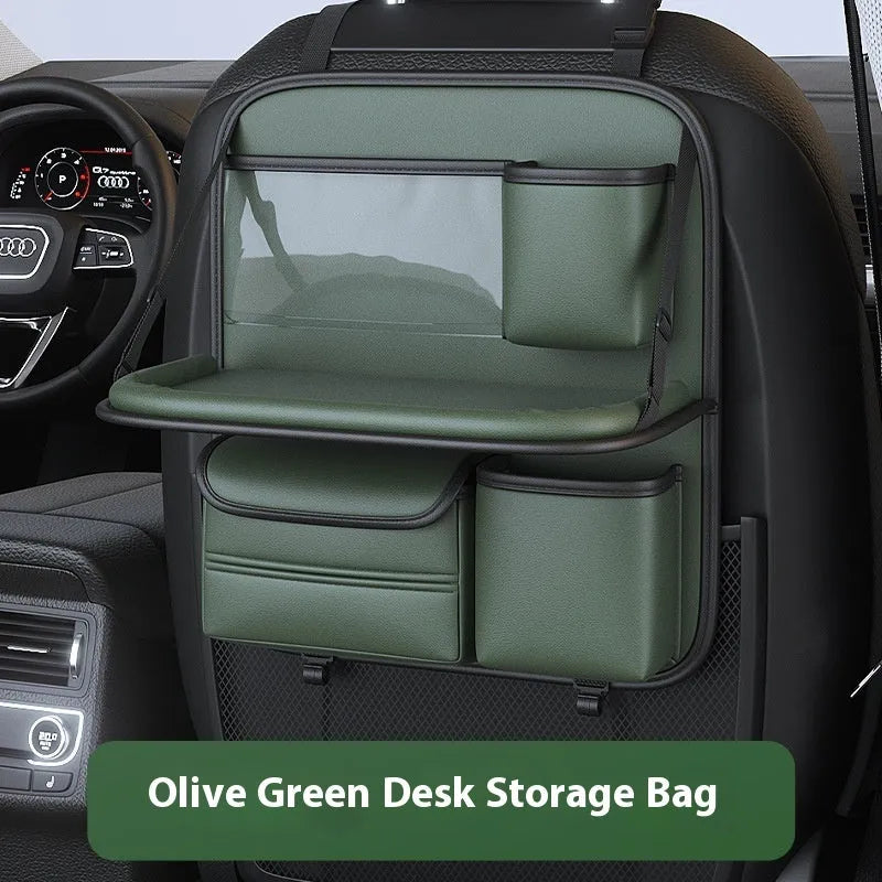 Leather car seat storage bag with carrying handle shown in black, hanging over a car seat.