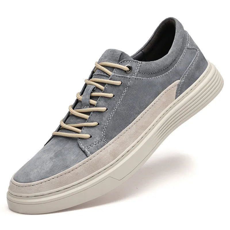 Men's grey casual leather skate shoes with round toe and lace-up front