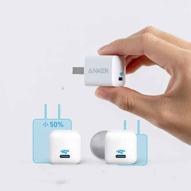 White 18W fast travel USB charger with a UK plug.